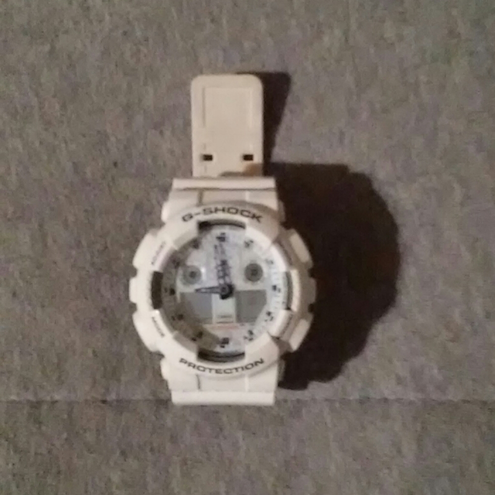 Purple / white g-shock watch